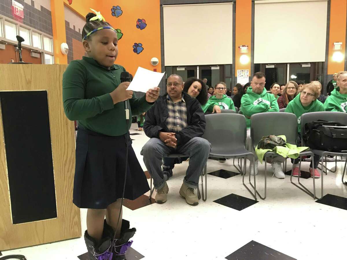 Elm City Montessori third grader Emery Thomas speaks to a Board of Education committee Monday in New Haven.