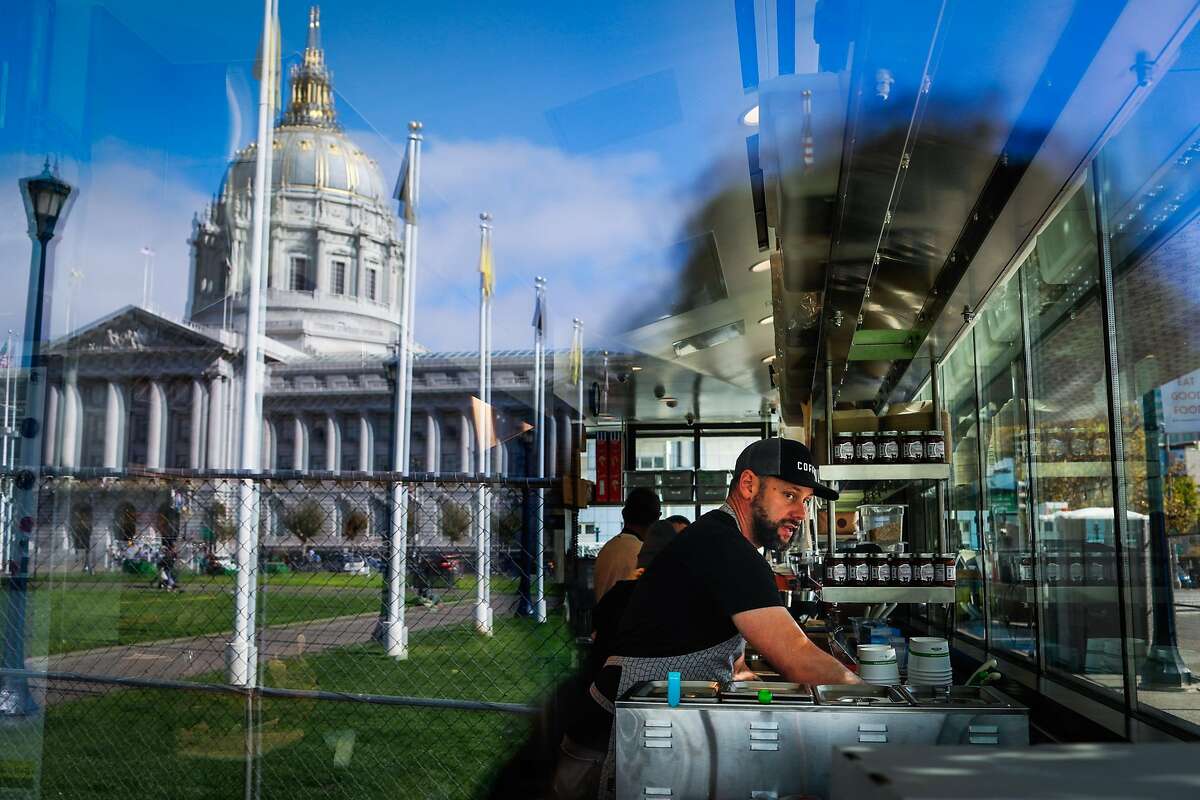 Jason Rose, a Bi-Rite cafe employee works at the cafe to get it ready a few days before it opens at Civic Center in San Francisco, California, on Sunday, Oct. 21, 2018.