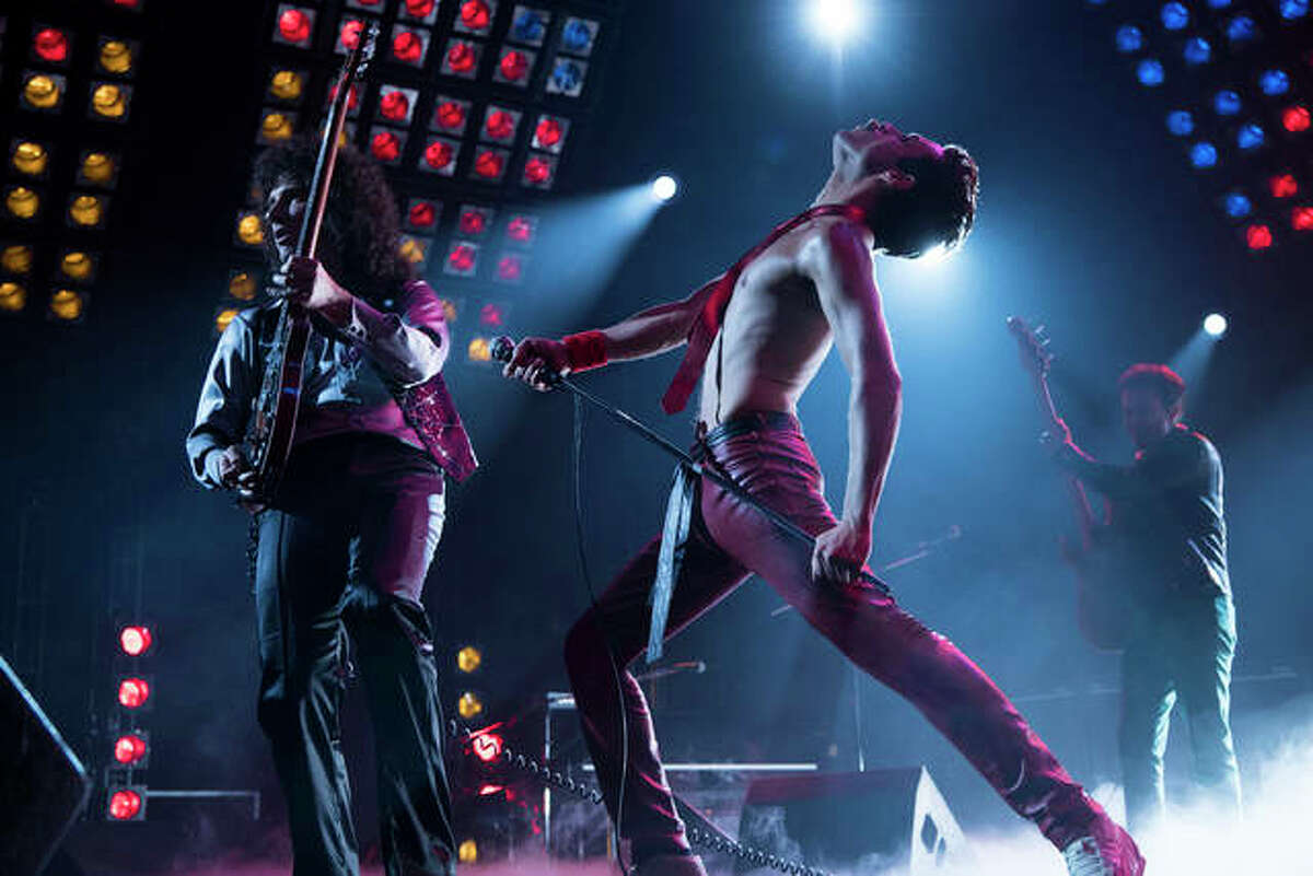 This image released by Twentieth Century Fox shows Gwilym Lee, from left, Rami Malek and Joe Mazzello in a scene from “Bohemian Rhapsody.”