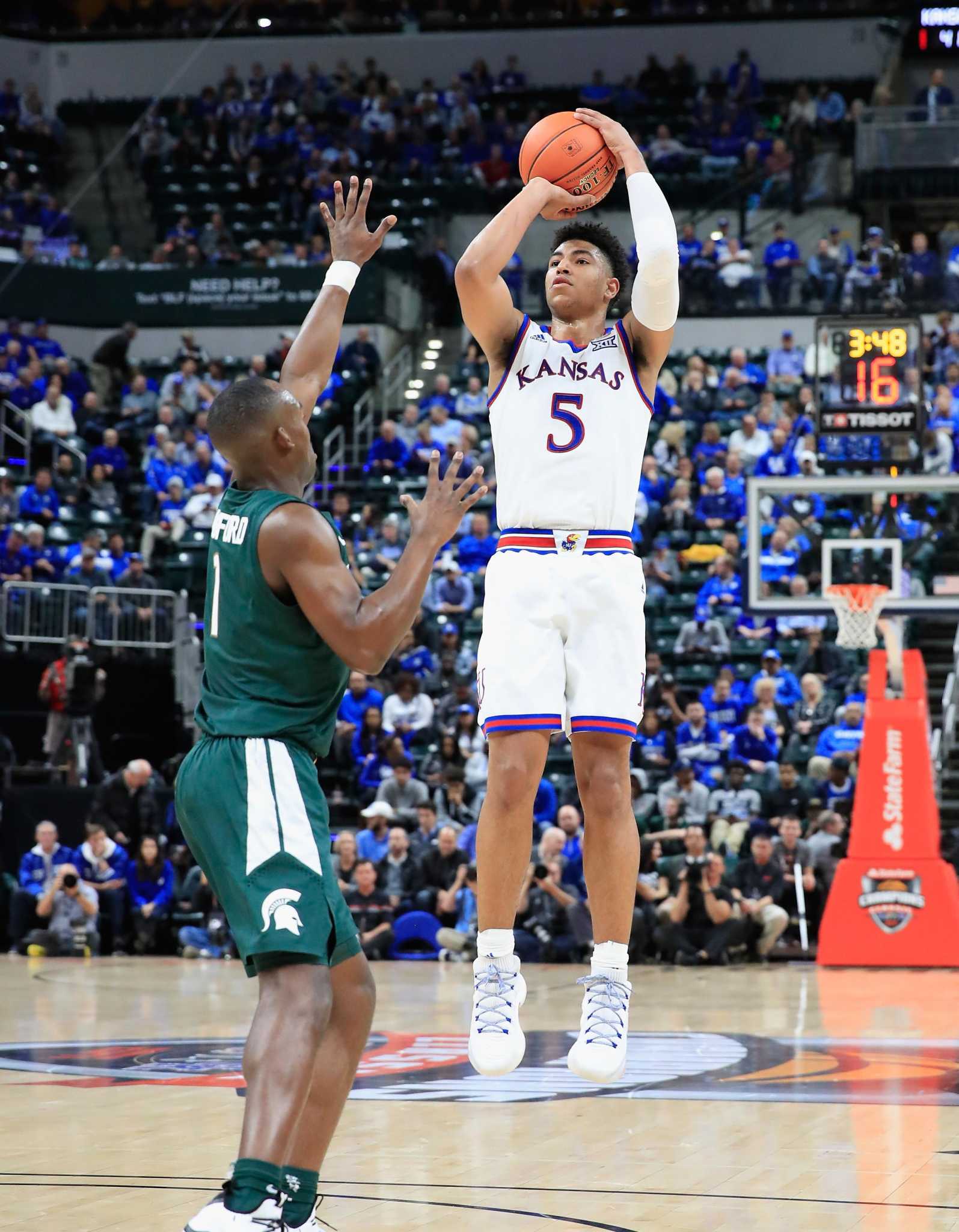 NCAA HOOPS Grimes leads Kansas to victory over MSU