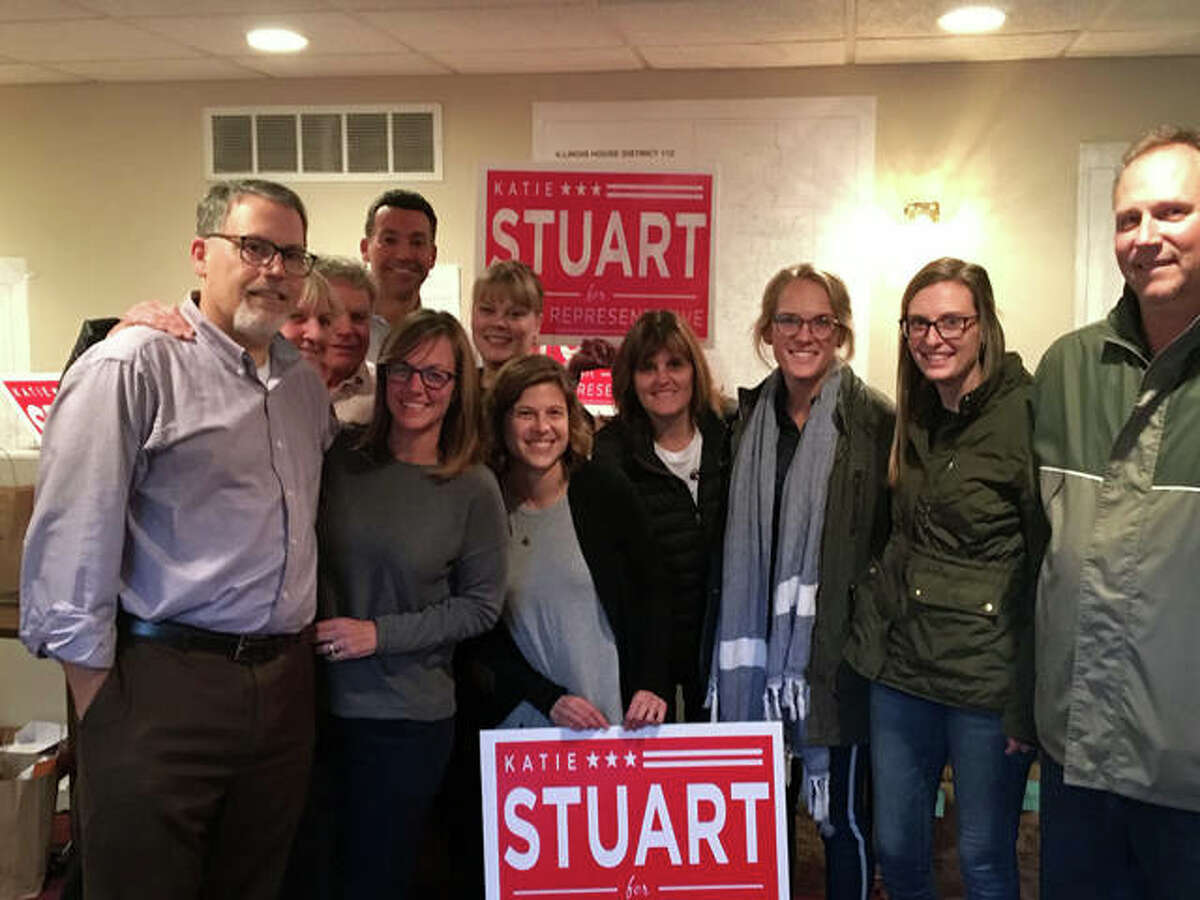 State Representative Katie Stuart (second from left) is surrounded by family and friends at her campaign office in Collinsville as she celebrates her election victory over challenger Dwight Kay. Stuart, the incumbent, will represent the citizens of the Illinois 112th District.