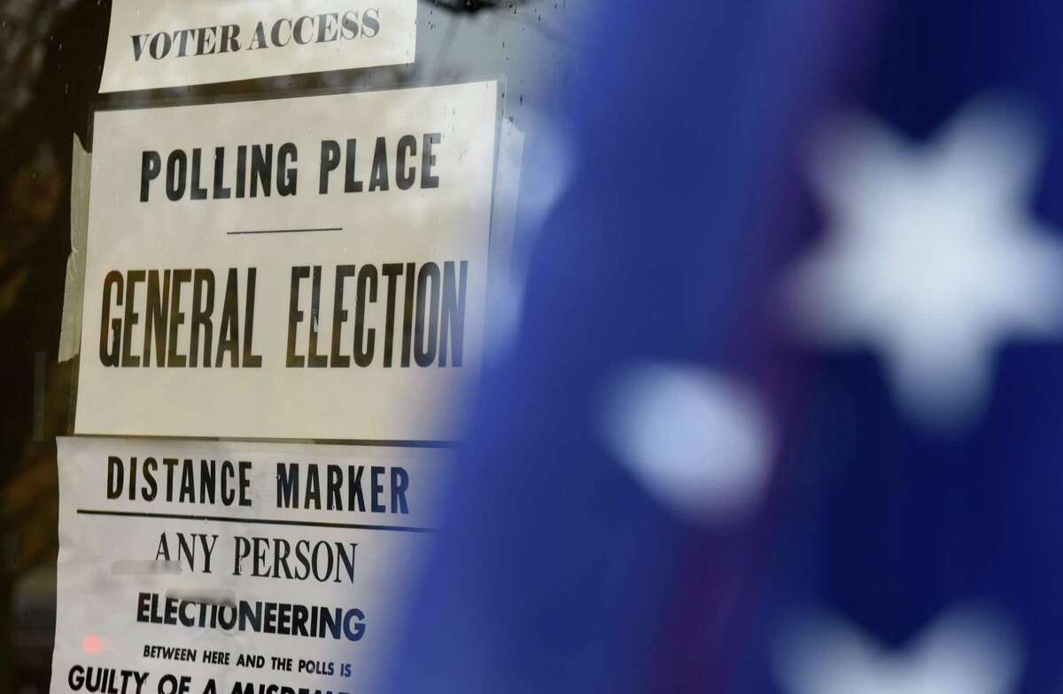 A polling station sign is placed outside Bethlehem Town Hall as voters take to the polls in midterm elections on Tuesday, Nov. 6, 2018, in Delmar, N.Y. (Will Waldron/Times Union)