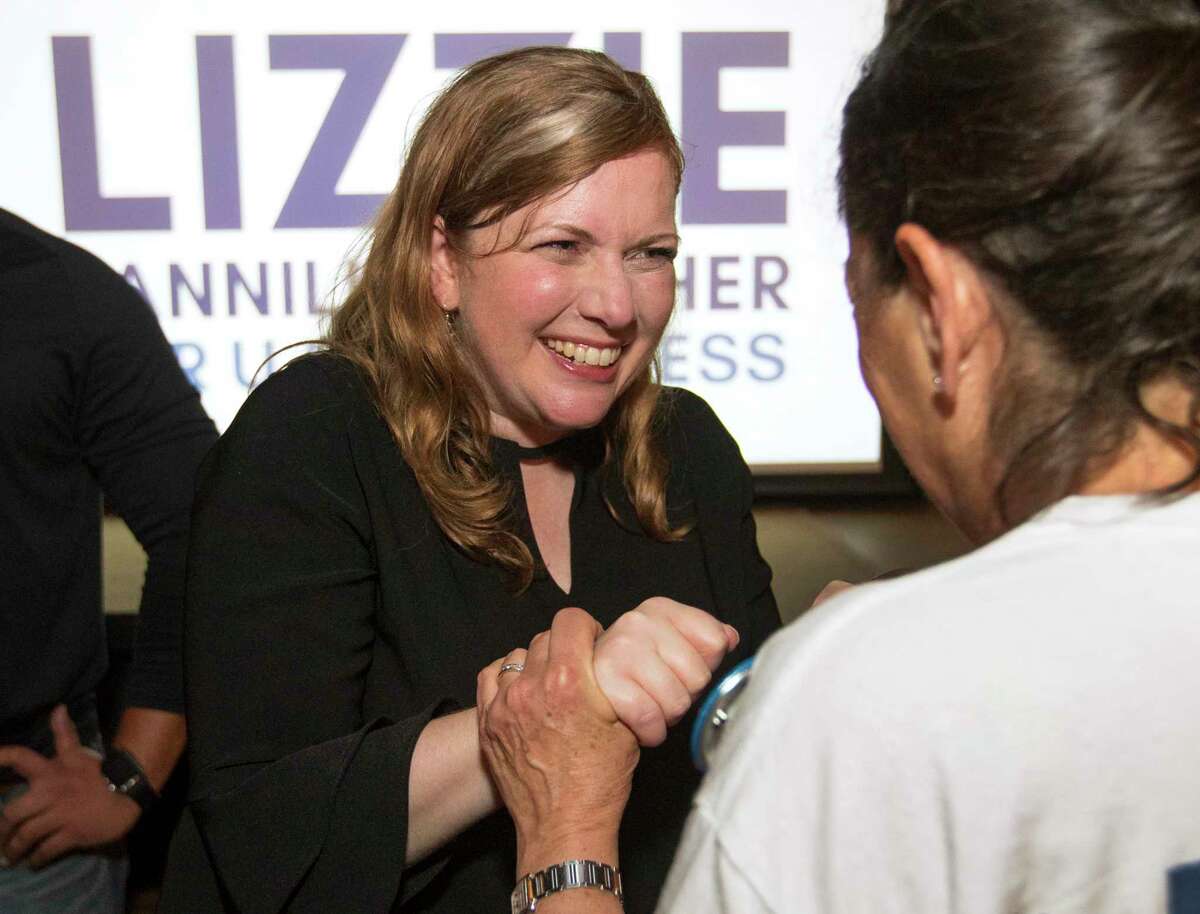 Democrat Lizzie Pannill Fletcher greets her supporters as they celebrate her win over John Culberson in the race or the 7th Congressional District seat in the House of Representatives on Wednesday, Nov. 7, 2018, in Houston.