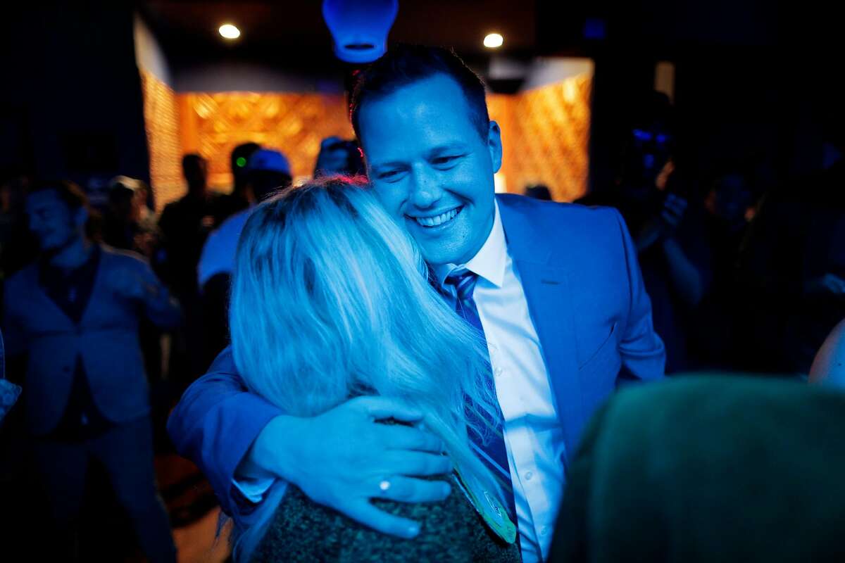 Supervisor District 6 candidate Matt Haney arrives and is hugged by his mother Kris Calvin at an election watch party for the District 6 Supervisor candidate in San Francisco, Calif., on Tuesday, November 6, 2018.