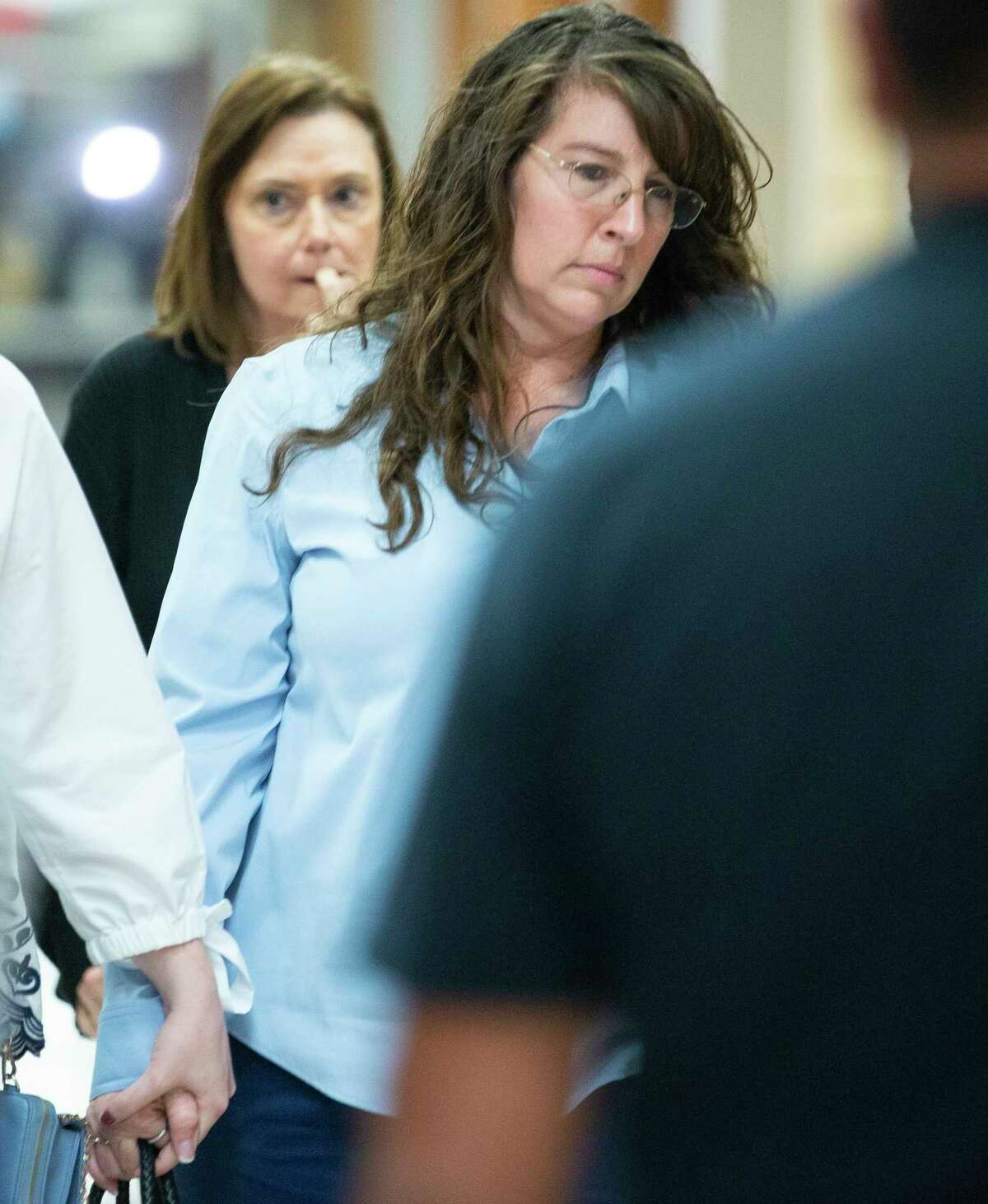 Chauna Thompson walks back into the courtroom after learning that a jury agreed on a 25-year prison sentence for her husband, Terry Thompson, for the choking death of John Hernandez during a sentencing hearing at Harris County Criminal Court, Wednesday, Nov. 7, 2018 in Houston. Thompson was with his wife, former deputy Chauna Thompson, when they got into a fight with Hernandez. Cell phone video from the incident showed the Thompsons holding Hernandez down on the ground.