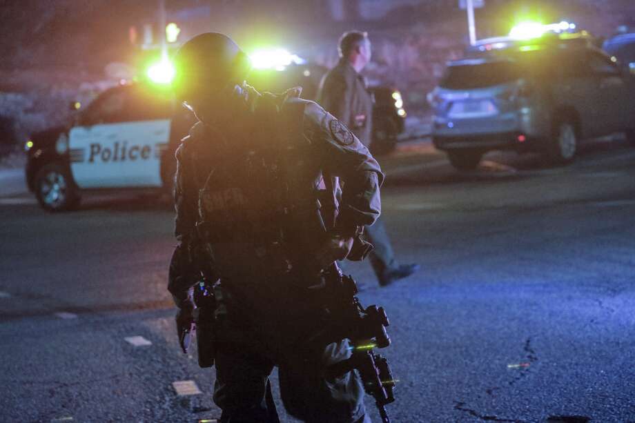 Police work in the area after a gunman opened fire late Wednesday at a Thousand Oaks bar packed with hundreds of people attending a popular event for college students, causing multiple fatalities on November 8, 2018 in Thousand Oaks, California. The gunman burst into the bar around 11:20 p.m., cloaked in all black as he threw smoke bombs and began shooting at targets as young as 18 inside the Borderline Bar & Grill, authorities and witnesses said. Photo: Irfan Khan/Getty Images