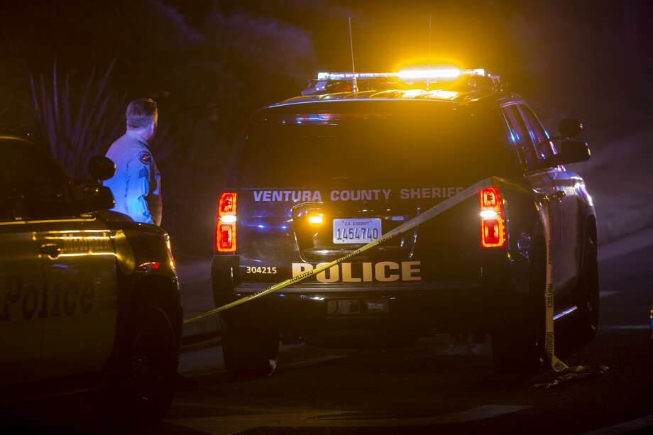 A Ventura County Sheriffs officer stands near a vehicle near the Borderline Bar and Grill, where a mass shooting occurred on November 8, 2018 in Thousand Oaks, California. At least twelve people have died, including a Ventura County Sheriffs Department sergeant, plus the gunman. Photo: David McNew/Getty Images