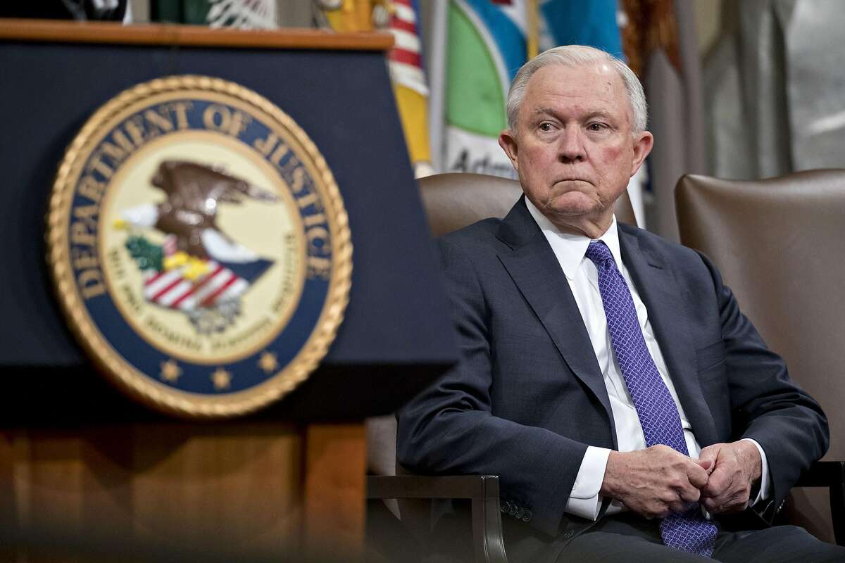 FILE: Jeff Sessions, U.S. attorney general, listens during an event on actions to combat the opioid crisis in the Great Hall at the Department of Justice in Washington, D.C., U.S., on Thursday, Oct. 25, 2018. U.S. Attorney General Jeff Sessions has resigned at the request of President Donald Trump following months of public criticism from the president, in the latest shakeup of the administration. Trump’s cabinet and cabinet-level positions have seen far more resignations and dismissals than other recent administrations. Our gallery pulls together Trump's top White House aides that have departed or announced their departure, Bannon, Bossert, Cohn, Flynn, Hicks, Manigault, Mcfarland, McGahn, McMaster, Powell, Priebus, Scaramucci, Short, Spicer and Sessions. Photographer: Andrew Harrer/Bloomberg