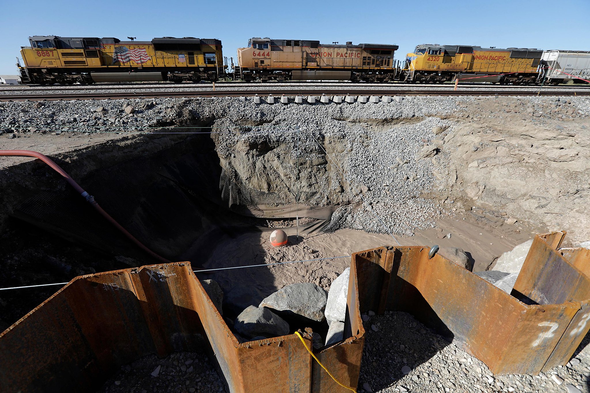 Slowmoving mud spring along San Andreas fault threatens railroad, highway