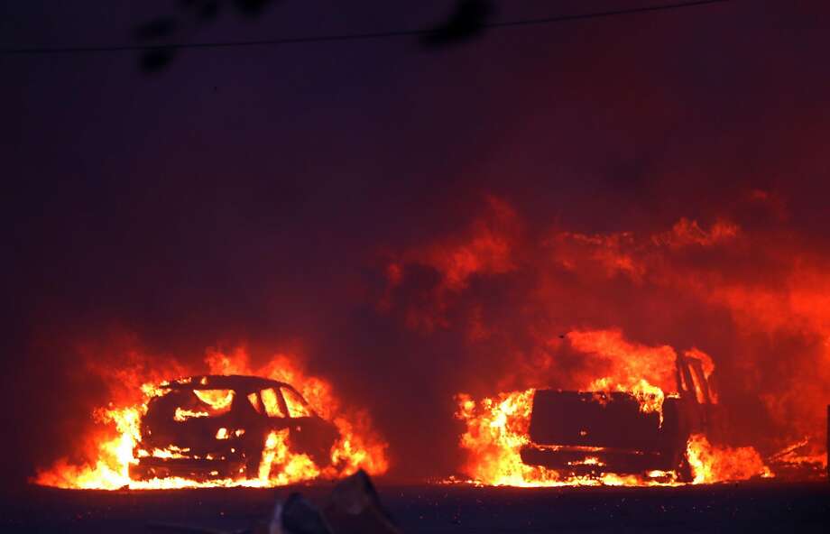 Vehicles burn during Camp Fire in Paradise, Calif.. on Thursday, November 8, 2018. Photo: Scott Strazzante, The Chronicle