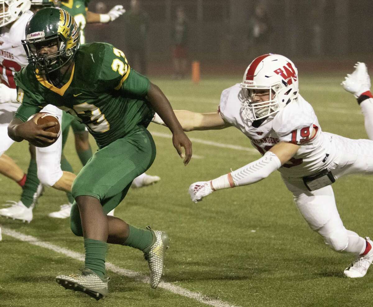 FOOTBALL: The Woodlands rumbles past Klein Forest, claims share of ...