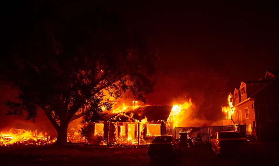 A home burns as the Camp fire tears through Paradise, California on November 8, 2018. - More than 18,000 acres have been scorched in a matter of hours burning with it a hospital, a gas station and dozens of homes. (Photo by Josh Edelson / AFP) (Photo credit should read JOSH EDELSON/AFP/Getty Images) Photo: JOSH EDELSON/AFP/Getty Images