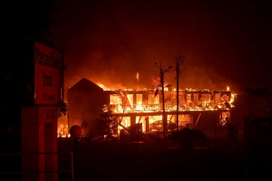 TOPSHOT - The Paradise Inn hotel burns as the Camp Fire tears through Paradise, North of Sacramento, California on November 08, 2018. - More than one hundred homes, a hospital, a Safeway store and scores of other structures have burned in the area and the fire shows no signs of slowing. (Photo by Josh Edelson / AFP) (Photo credit should read JOSH EDELSON/AFP/Getty Images) Photo: JOSH EDELSON/AFP/Getty Images