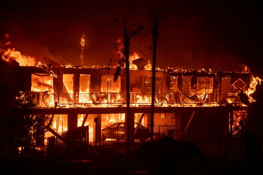 AFTER: Paradise Inn The motel at 5423 Skyway burns as the Camp Fire tears through Paradise, Calif., on Nov. 08, 2018. Photo: JOSH EDELSON/AFP/Getty Images