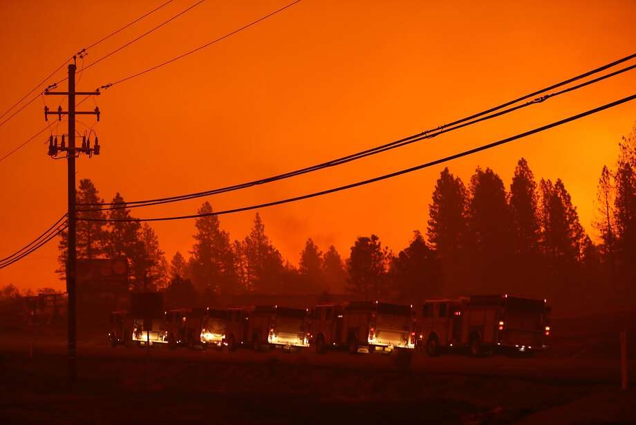 Fire trucks stage on Highway 191 during Camp Fire in Paradise, Calif. on Friday, November 9, 2018. Photo: Scott Strazzante / The Chronicle