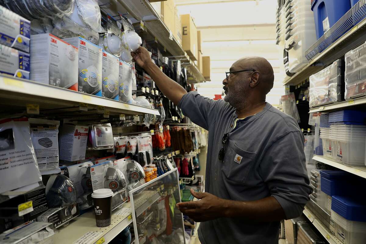 David Anderson shops for a respirator at Ace Hardware store, located at 1221 Grand Ave., in Piedmont, Calif. on Friday, November 9, 2018. Air masks at the store are ranging from $3.28 to $39.99.