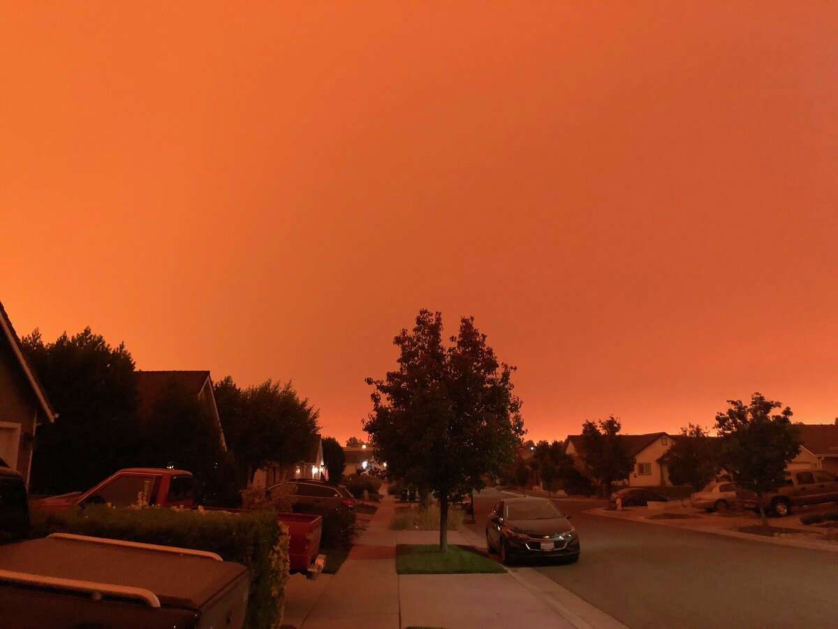 Photos of Chico taken Friday afternoon showed a dark sky, choked by smoke from the nearby Camp Fire.
