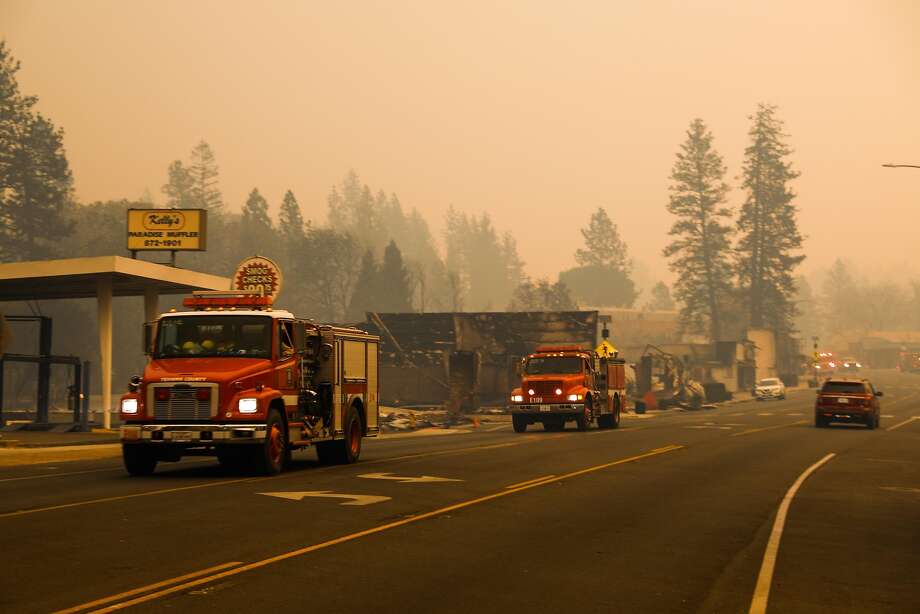 AFTER: Kelly's Paradise Muffler, Paradise Cars pass through Skyway after the Camp Fire tore through the town of Paradise, Calif. on Friday, Nov. 9, 2018. Photo: Gabrielle Lurie, The Chronicle