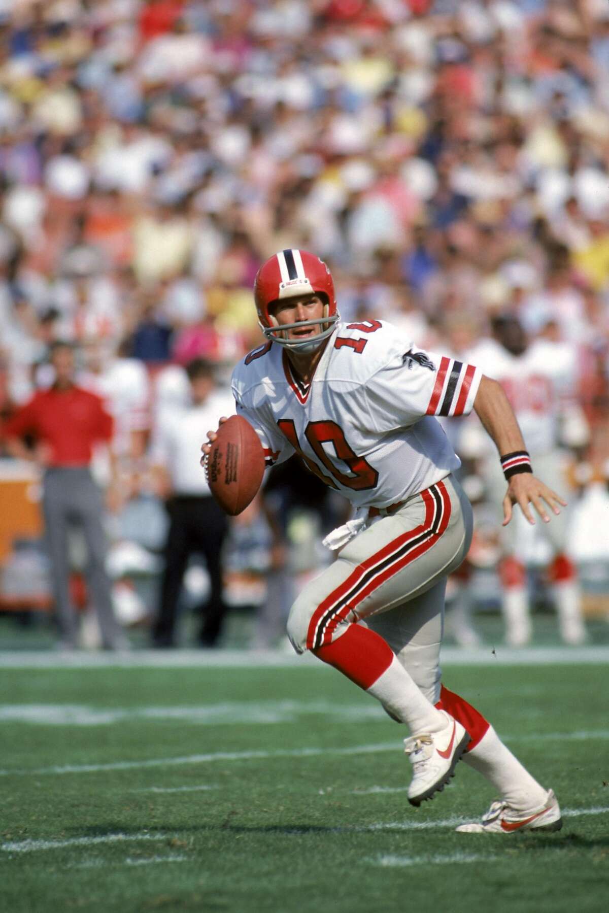 Atlanta Falcons quarterback Steve Bartkowski rests his head in a