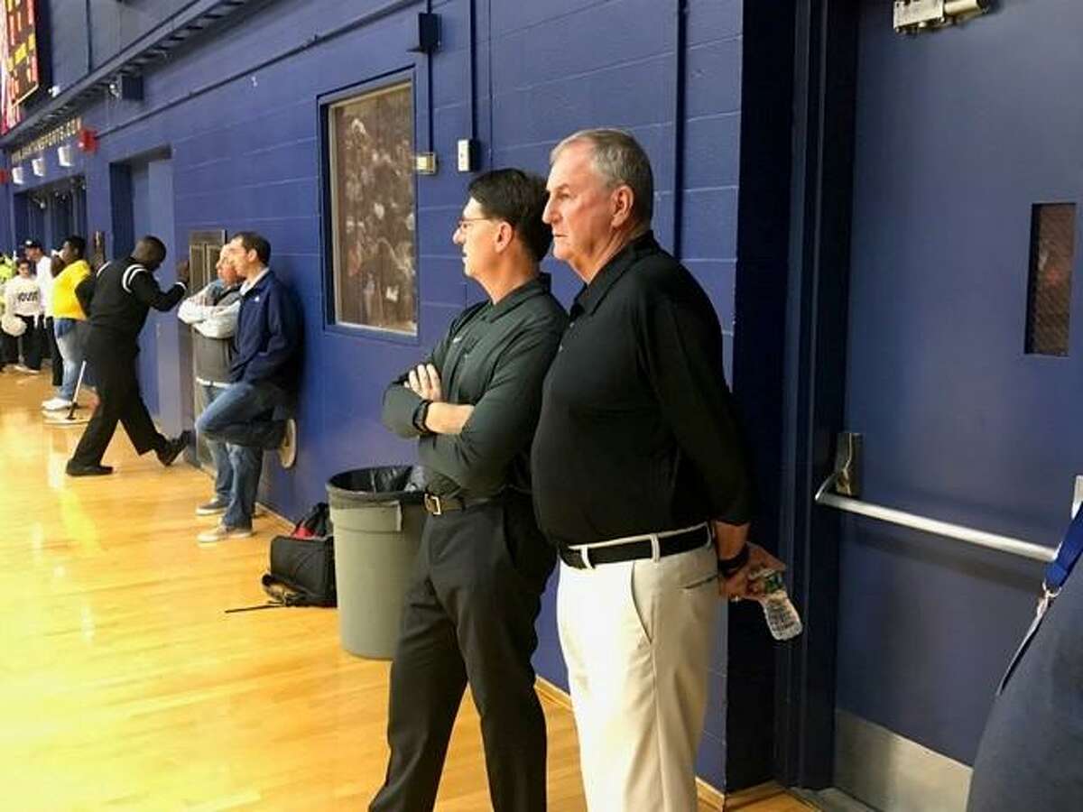 Jim Calhoun, right, and former UConn and current University of Saint Joseph assistant Glen Miller prior to Friday night's game.