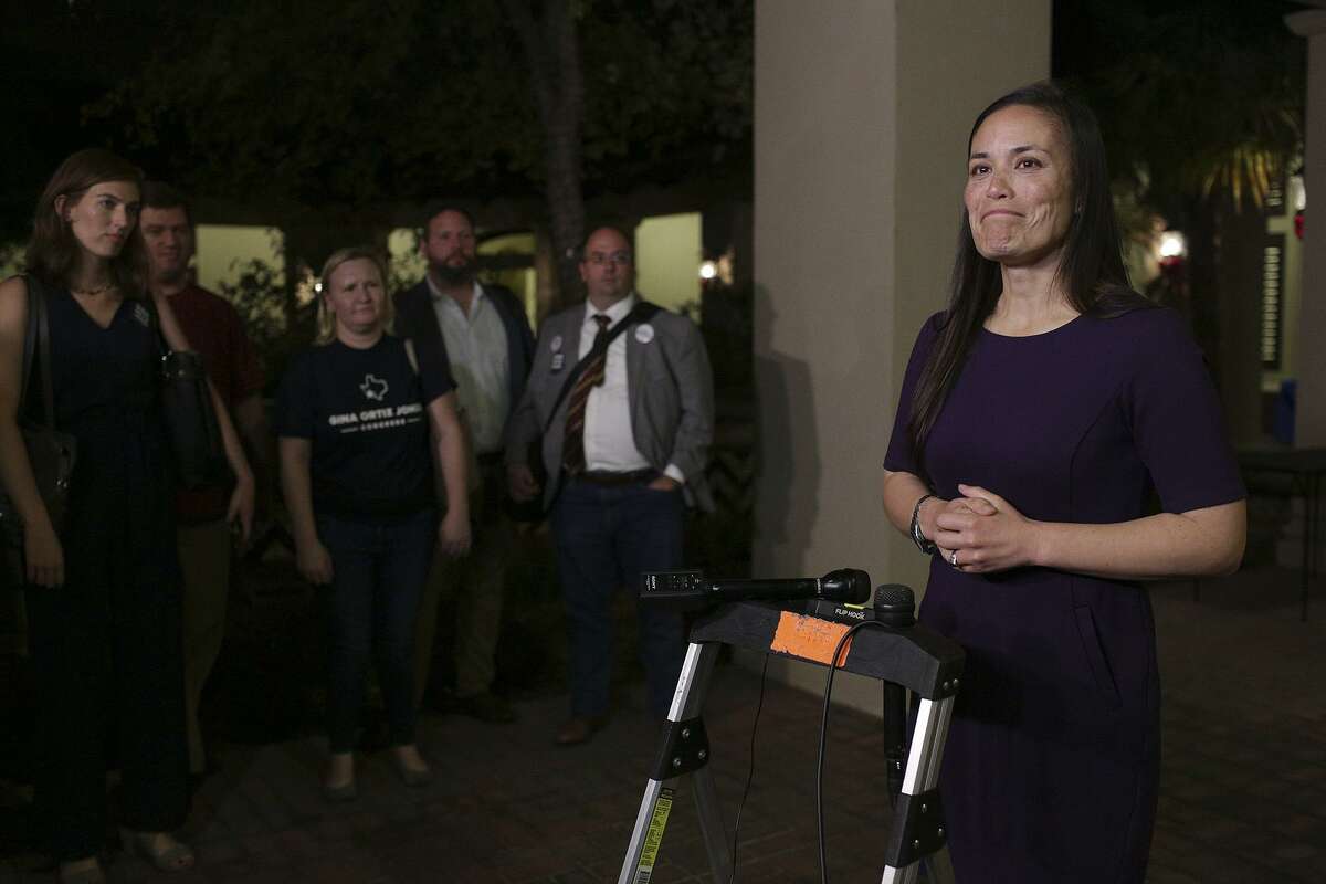 Gina Ortiz Jones, speaking after the Bexar County Democratic Party’s election night watch party, is awaiting the results of at least 859 outstanding ballots in the race for Congressional District 23.