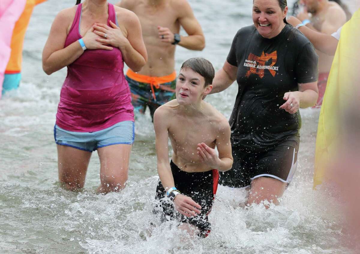 Bathers braced themselves for the cold Saturday when they jumped into the cold water for 11th Annual Lake George Polar Plunge, a benefit for Special Olympics of New York. The event was held at Shepard's Park Beach, Lake George on Saturday, Nov. 18, 2017.