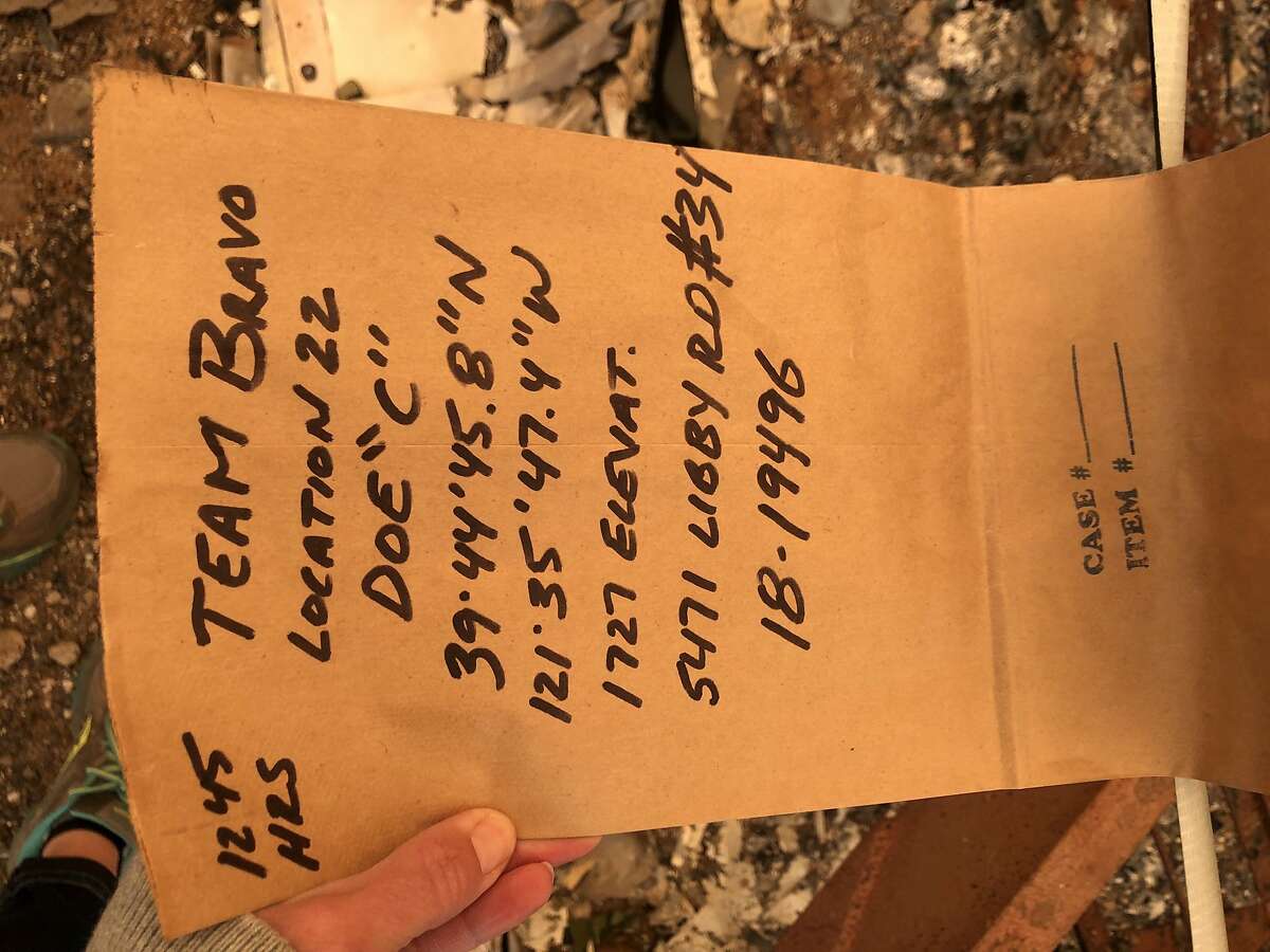 A note hangs from the mobile home space of Paradise resident Vinnie Carota, whose family believes died in the Camp Fire.