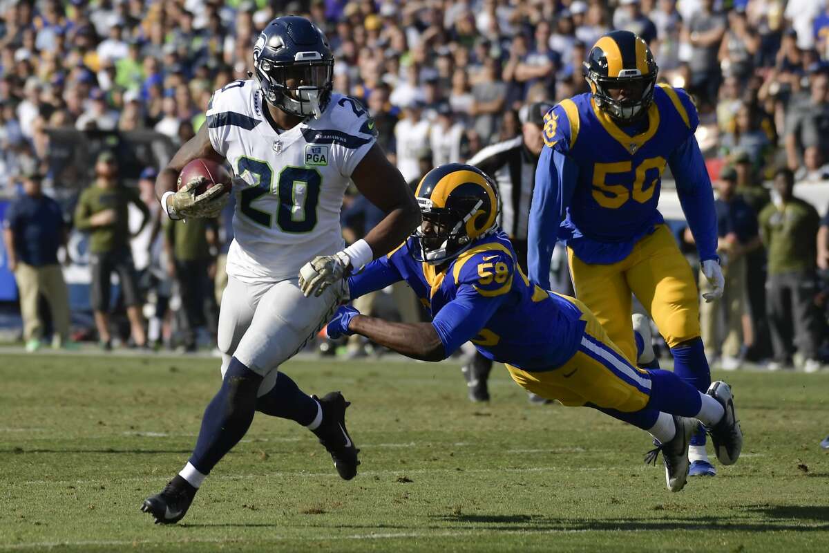 PENNY HAD BREAKOUT GAME; RUN GAME FOUND SUCCESS WITHOUT CARSON, FLUKER  Starting tailback Chris Carson and physical right guard D.J. Fluker, both focal points in Seattle’s dominant run attack this season, were inactive Sunday vs. the Rams.  It didn’t seem to matter for the Seahawks. The Rams knew they’d run the ball (The writing was on the wall. The Seahawks have been the best rushing team since Week 3), but they still had success doing it.  The team rushed for a season-high 273 yards on Sunday -- smashing their previous best of 190 (which also happened against the Rams). Penny -- the first-round of pick, subject of criticism for the slow start to his rookie season -- had his best game as a pro thus far, rushing 12 times for 108 yards and a touchdown. Quarterback Russell Wilson, who’s been scrambling much less this season, had a season-high 92 yards with his feet. And Mike Davis, who got the start in the backfield, added an efficient performance: 11 carries for 58 yards. "Today, (Penny) just busted out," head coach Pete Carroll said. "We've been on him hard. We've been challenging him to get right and to work at the right tempo, to find what it's like to be a pro. We're just teaching him. He's just a young guy figuring it out. "I thought today, he needed it so badly. ... We've worked him through it and I was just hoping that he would get a chance in one of these games to get the opportunity to show it. And maybe from this point forward, you see him just take off. He looked fantastic today. It's great for us."