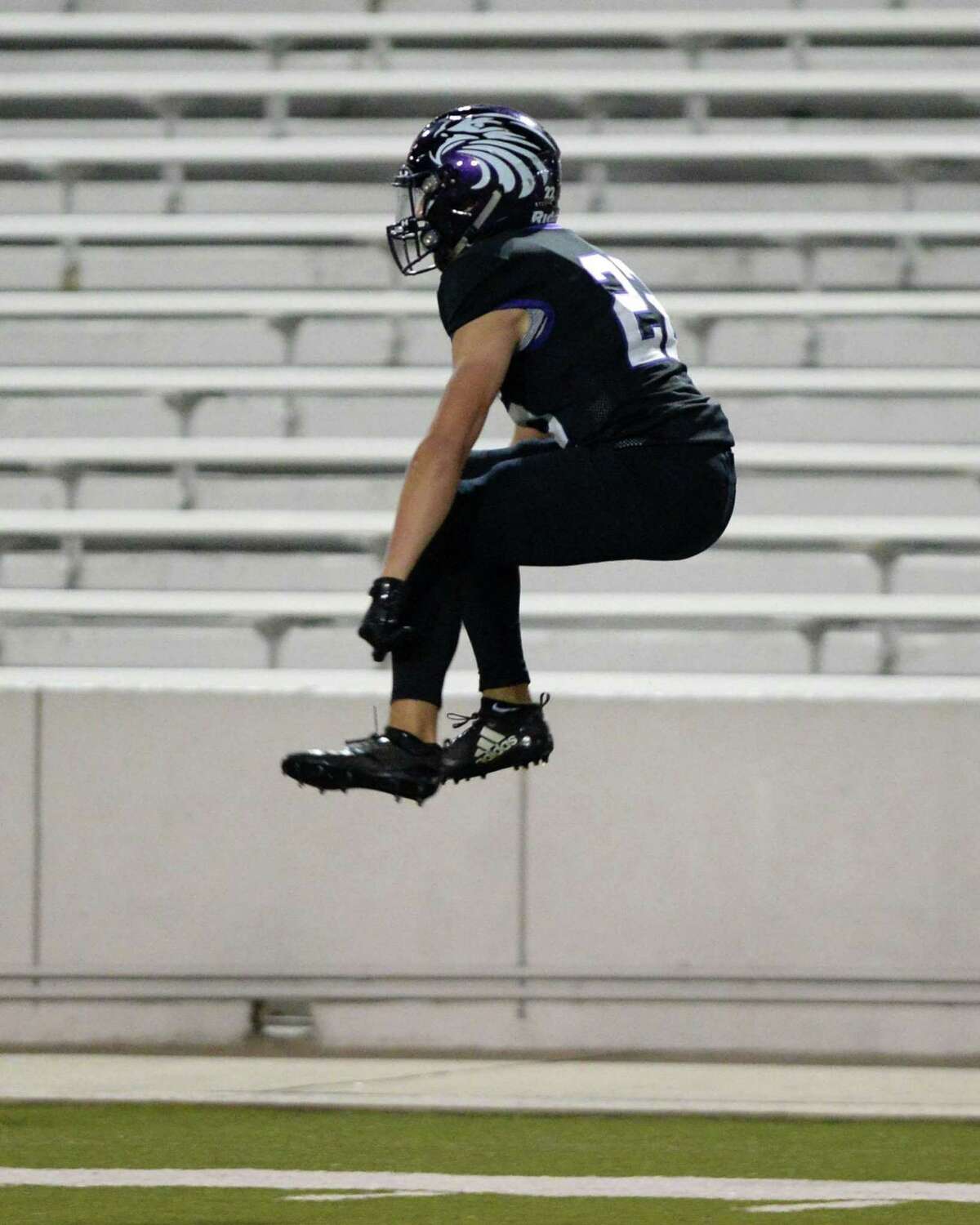 Victor Garza (22) of Kinkaid celebrates a touchdown reception in the final seconds of the second quarter of the SPC Class 4A Championship football game between the Episcopal Knights and the Kinkaid Falcons on Saturday, November 10, 2018 at Delmar Stadium, Houston, TX.