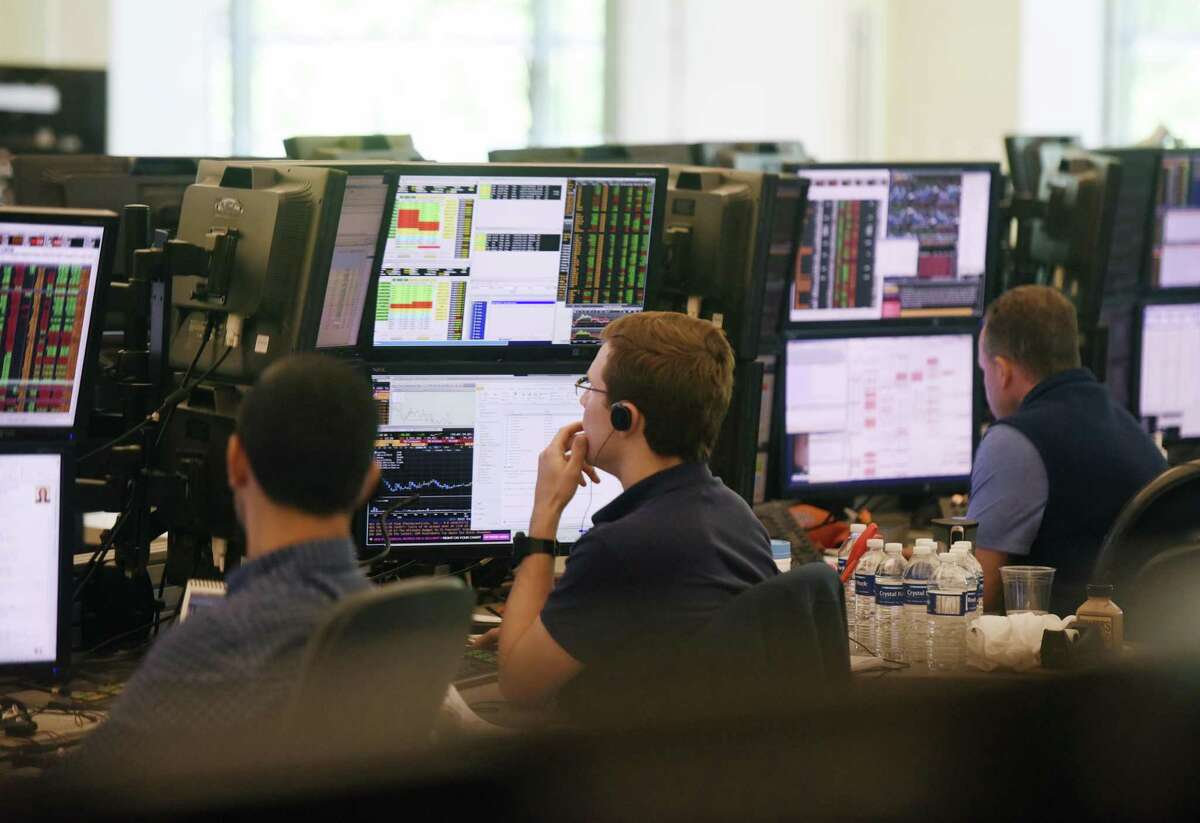 Investment professionals work on the trading floor at Point72 Asset Management's global headquarters at 72 Cummings Point Road in Stamford, Conn., on July 18, 2016.
