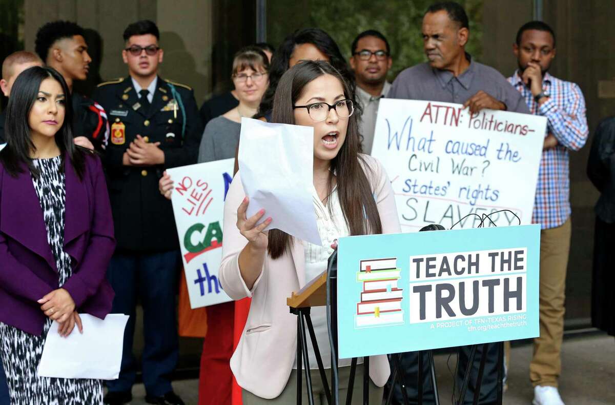 Carisa Lopez, representing the Texas Freedom Network, delivers her message to the media outside after speaking to the State Board of Education as it hears comments on proposed changes to the state's social studies curriculum at its meeting in Austin on September 11, 2018.