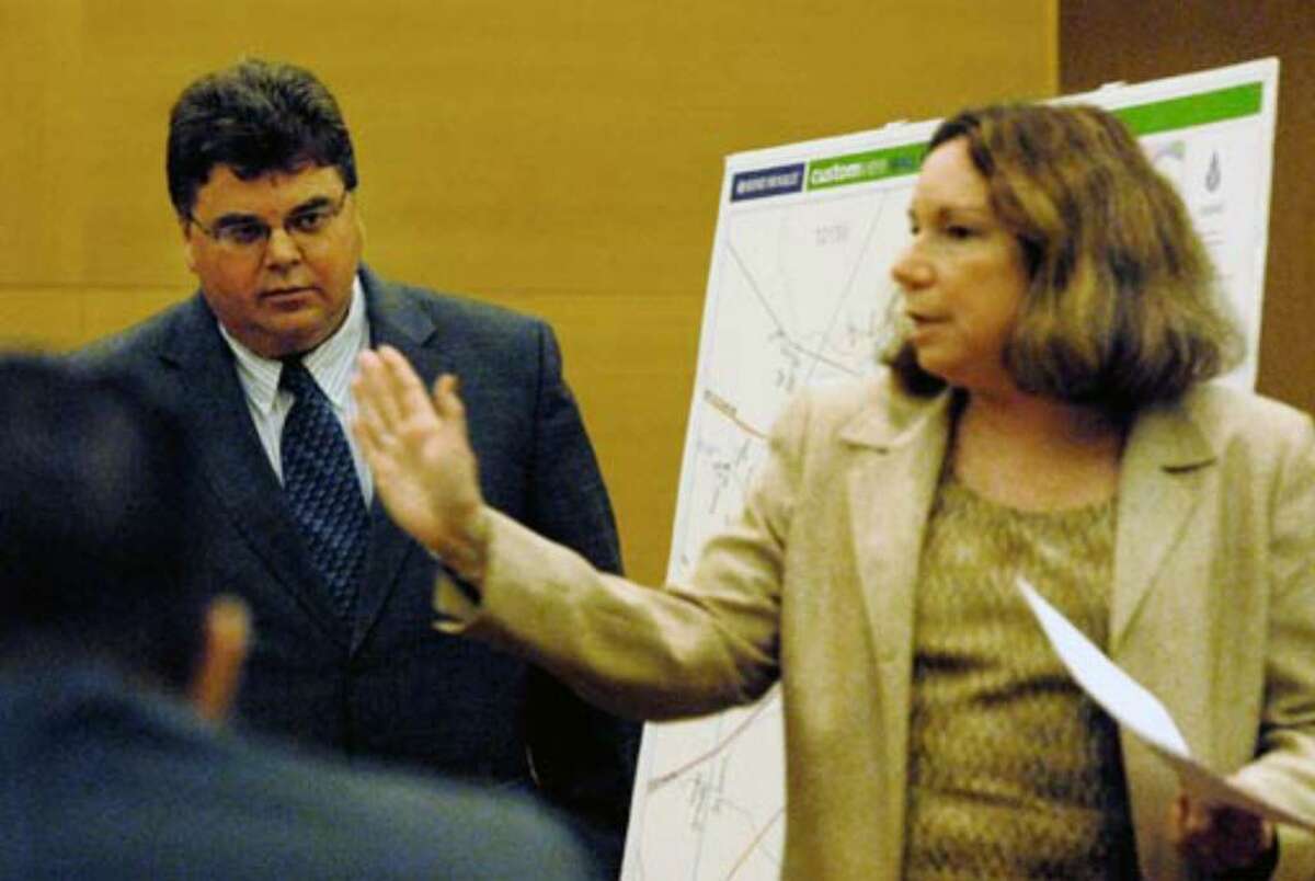 Former neighbor and prosecution witness Marshall Gokey, at left, is questioned by defense attorney Laurie Shanks Wednesday August 2, 2006.