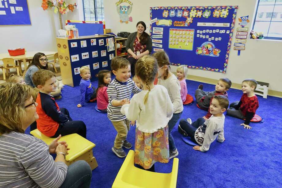 Helping Hands A Nursery School With Room For All Times Union Children And Teachers Take Part In Circle Time At Helping Hands School On Wednesday Oct