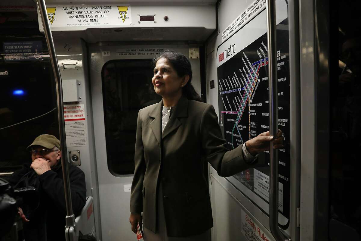 Sonali Bose, SFMTA Director of Finance and Information Technology, rides a MUNI streetcar to have her portrait taken on Tuesday, November 13, 2018 in San Francisco, Calif.