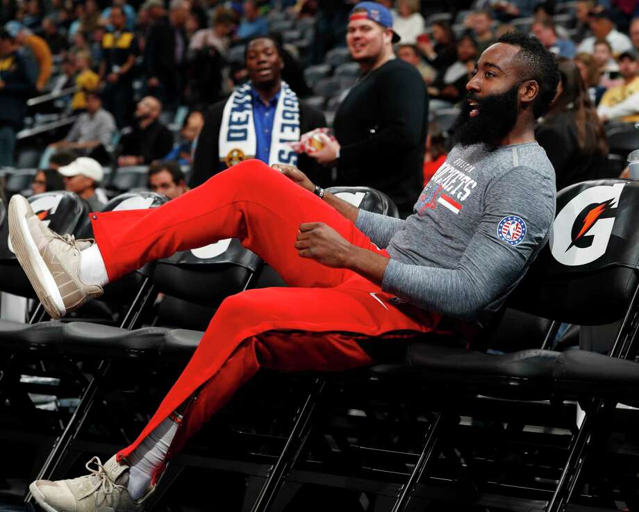 Houston Rockets guard James Harden jumps on a seat on the bench before facing the Denver Nuggets in an NBA basketball game Tuesday, Nov. 13, 2018, in Denver. (AP Photo/David Zalubowski) Photo: David Zalubowski, Associated Press / Copyright 2018 The Associated Press. All rights reserved.