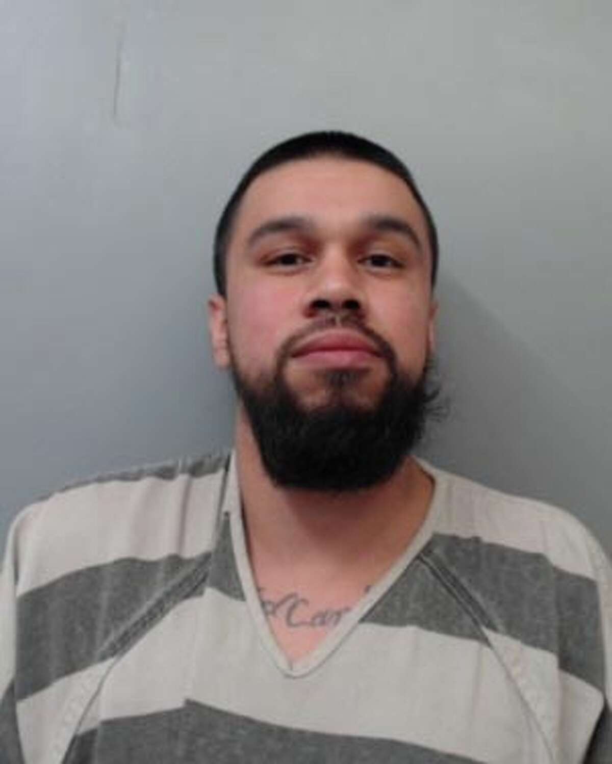 Jorge Luis Garza, 26, was charged with assault.