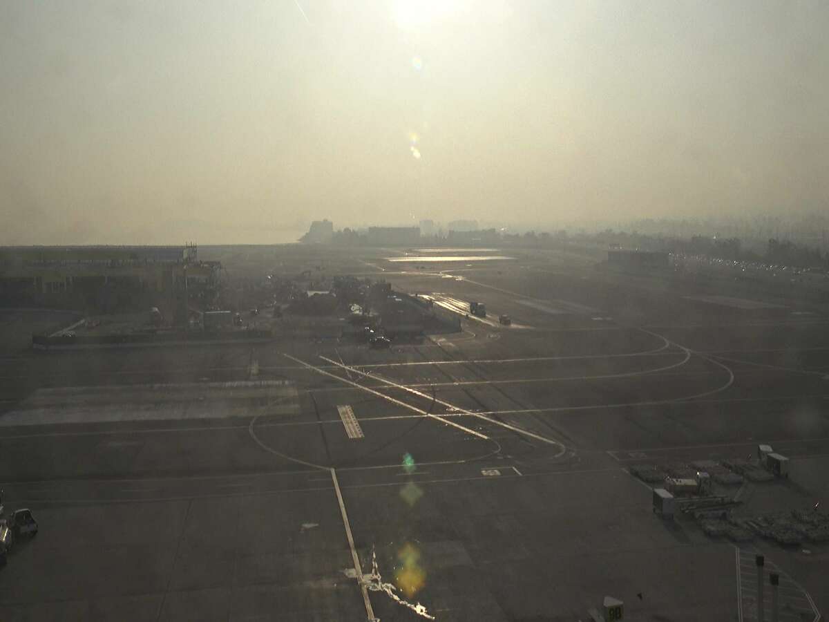 NWS CWSU Oakland tweeted on Nov. 14, 2018, "Another day of smoke and haze impacting operations with delays at @flySFO. Little to no improvement of the smoke is anticipated today as low level wind flow is not favorable to push the smoke out of the region. #CampFire #Delays #Smoke."