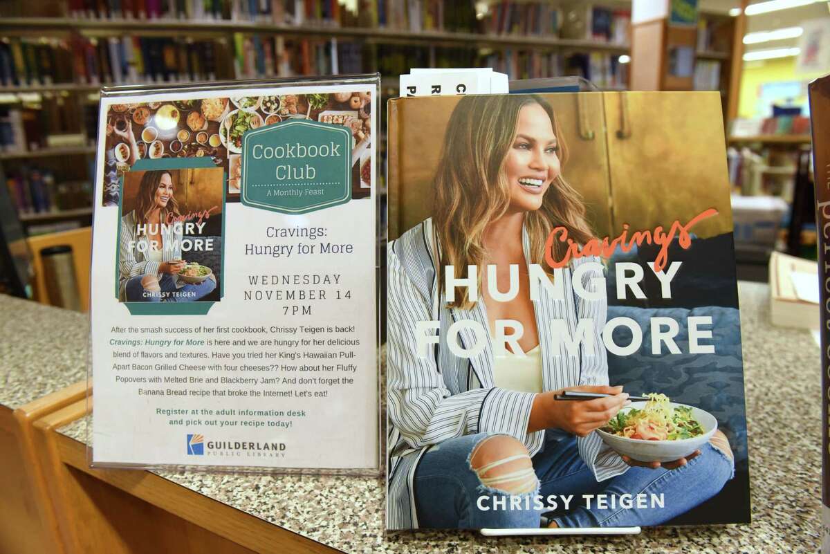 This month's cooking club book is "Hungry For More" by Chrissy Teigen which is part of the kitchen loan program at Guilderland Public Library on Thursday, Nov. 8, 2018 in Guilderland, N.Y. (Lori Van Buren/Times Union)