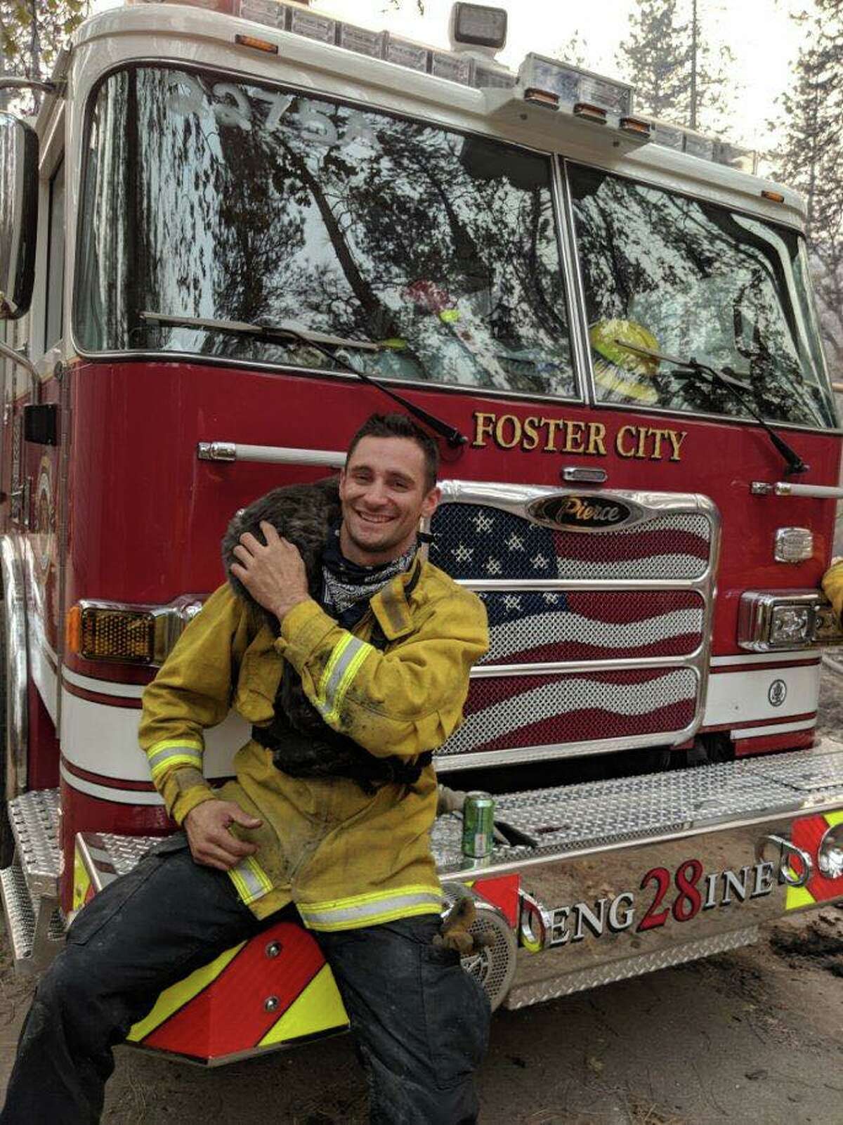 Firefighters from the Foster City Fire Department who were sent to Butte County to battle the Camp Fire rescued an injured cat.