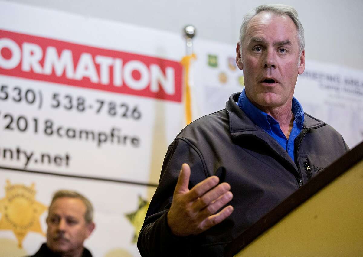 Governor Jerry Brown and U.S. Secretary of the Interior Ryan Zinke join Cal Fire, FEMA and Cal OES officials during a press conference at the Silver Dollar Fairgrounds in Chico, Calif. Wednesday, Nov. 14, 2018.