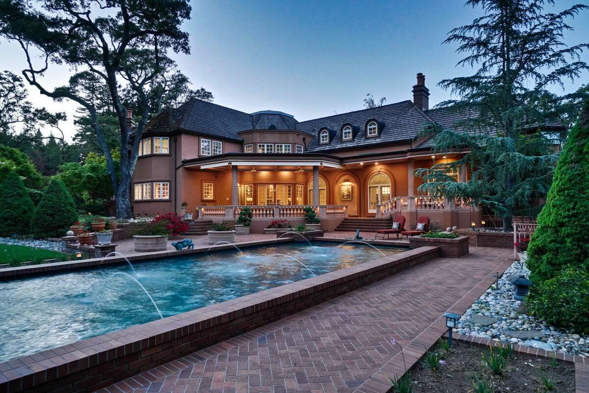 After sitting on the market for 7 years, overthetop Woodside mansion