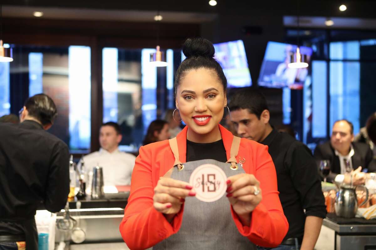 Ayesha Curry visited International Smoke, the restaurant she owns with partner chef Michael Mina, in Houston Wednesday. The cookbook author and lifestyle expert is in Houston for several days with events at the restaurant and to benefit Kids' Meals to end childhood hunger.