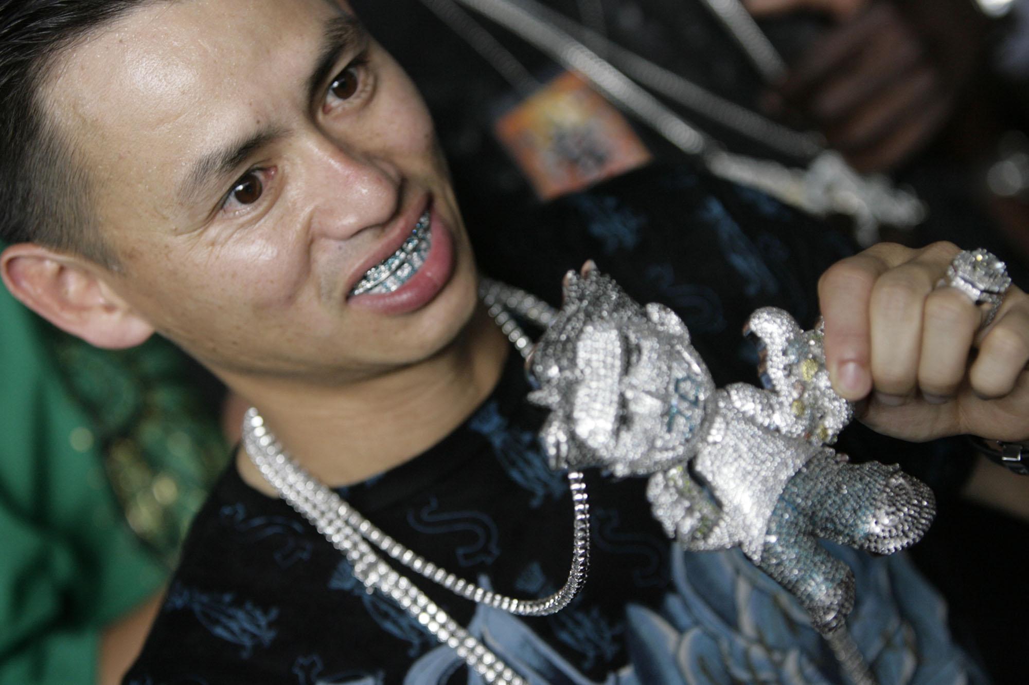 This is what it’s like waiting to meet Johnny Dang, Houston’s King of Bling