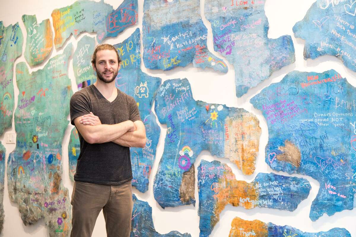 Houston artist Justin Garcia uses art as therapy to help abused children through a program at the Children's Assessment Center.  The project, ?“Reflections of Growth,?” is part of Garcia's eight-piece series.