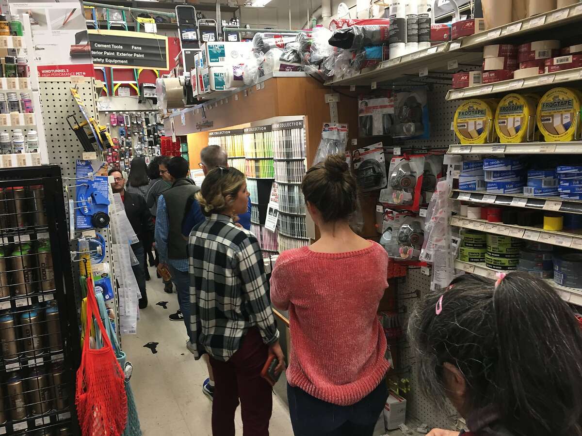 A line for air masks and respirators extends throughout the store at Cole Hardware on Fourth Street in San Francisco on Thursday, Nov. 15 in San Francisco, Calif.