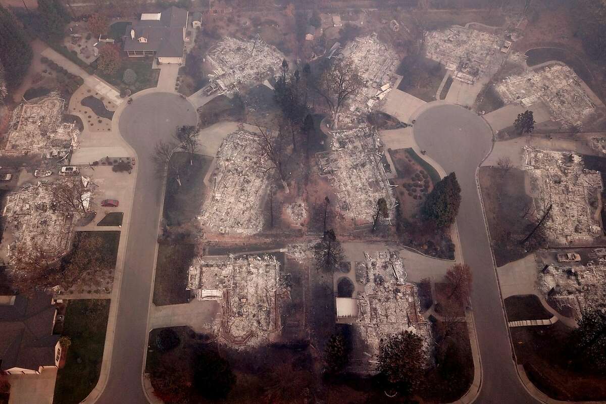 The homes and structures at Melene Court (left) and Mountain Meadow Court off of Country Oak Drive, Thursday, Nov. 15, 2018, in Paradise, Calif. As of this morning, the Camp Fire has burned 140,000 acres. The wildfire is 40% contained. 56 people have died.
