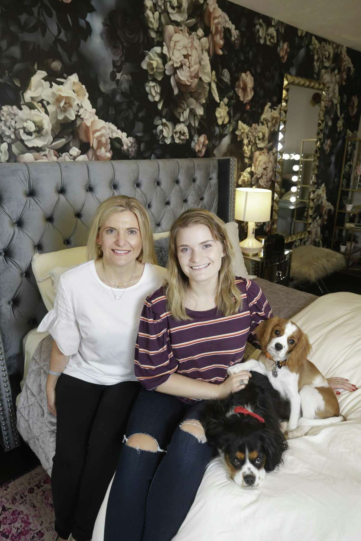 Houston interior designer Rainey Richardson designed a room for Brooke Kotrla, right, pictured with her mother Deanna Kotrla, and her dogs, Reggie and Bennett. Richardson wanted to give back to the community, she works through Texas Children's Hospital to improve the bedroom environments of the chronically ill.