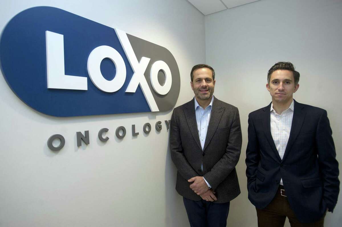 Loxo Oncology Chief Executive Officer Josh Bilenker, left, and Chief Business Officer Jacob Van Naarden pose for a photo inside the company's headquarters at 281 Tresser Blvd., in downtown Stamford, Conn. on Oct. 24, 2018.