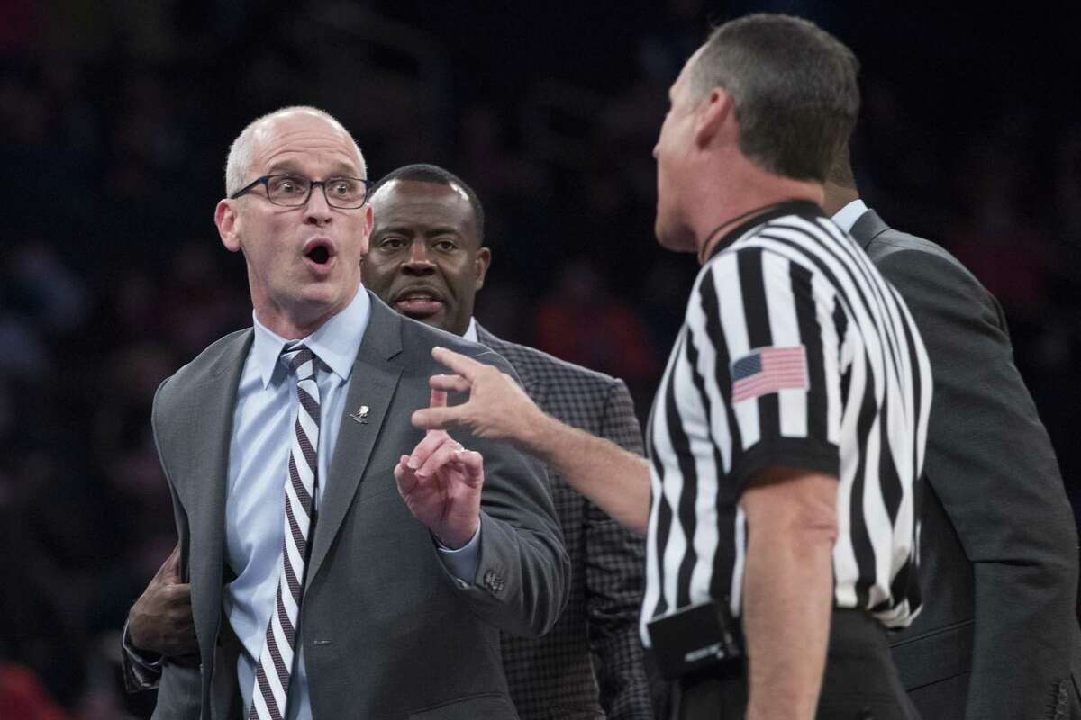 UConn head coach Dan Hurley, left, argues with the referee during the final game in the 2K Empire Classic, on Friday at Madison Square Garden in New York.