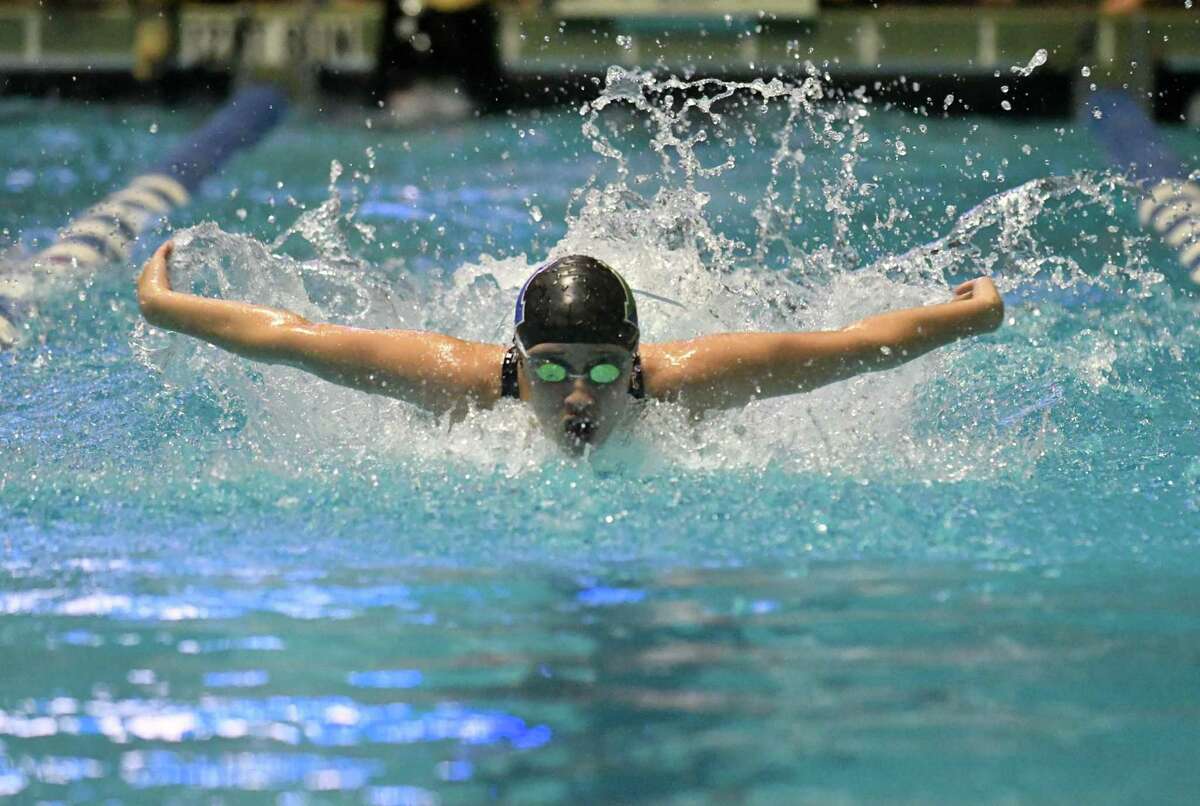 Ashley Calderon of Norwalk/McMahon swims the butterfly leg of the 200 yd medley relay during the CIAC Open Swimming Championships on Saturday November 17, 2018, at Yale University in New Haven, Connecticut.
